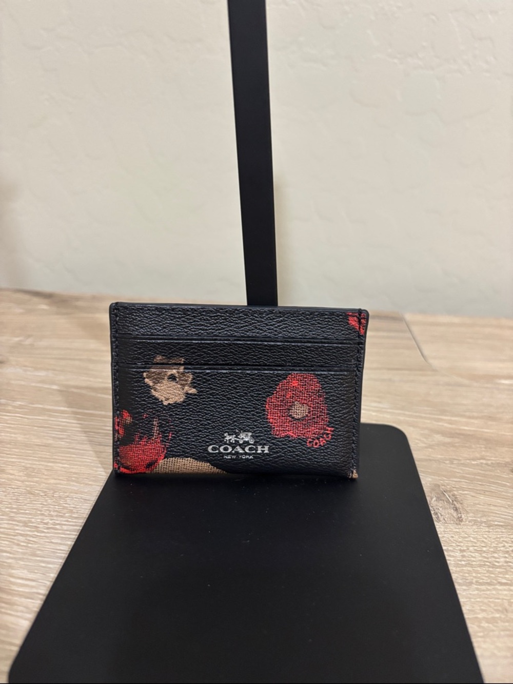COACH Black Leather Floral Card Holder with Red Accents